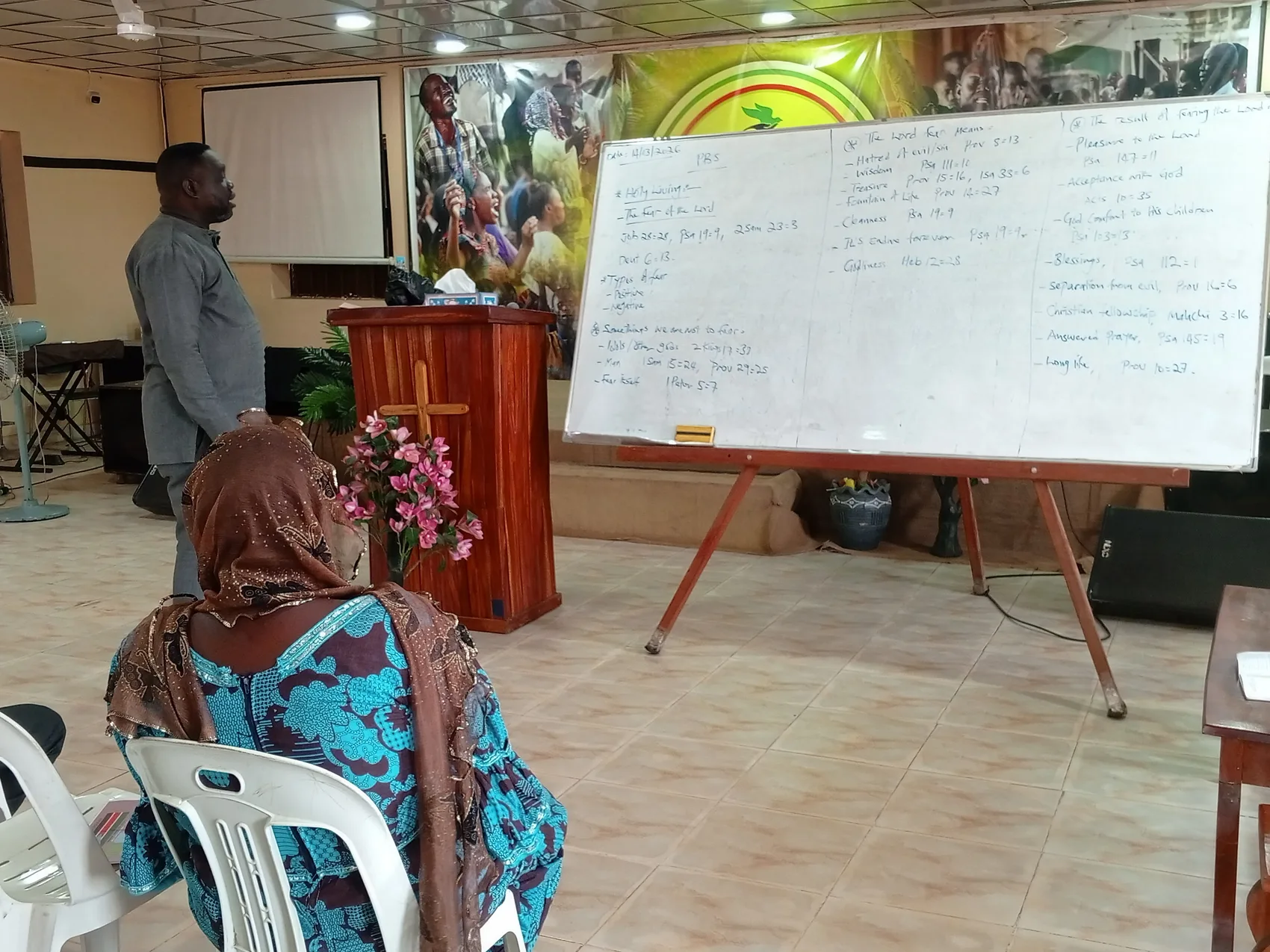 A Portable Bible School teaching session at the whiteboard